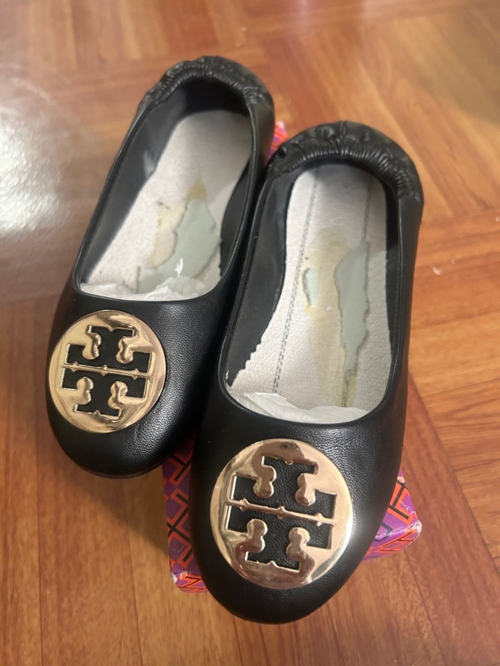 Tory Burch Black Ballet Flats with Gold Logo Medallion